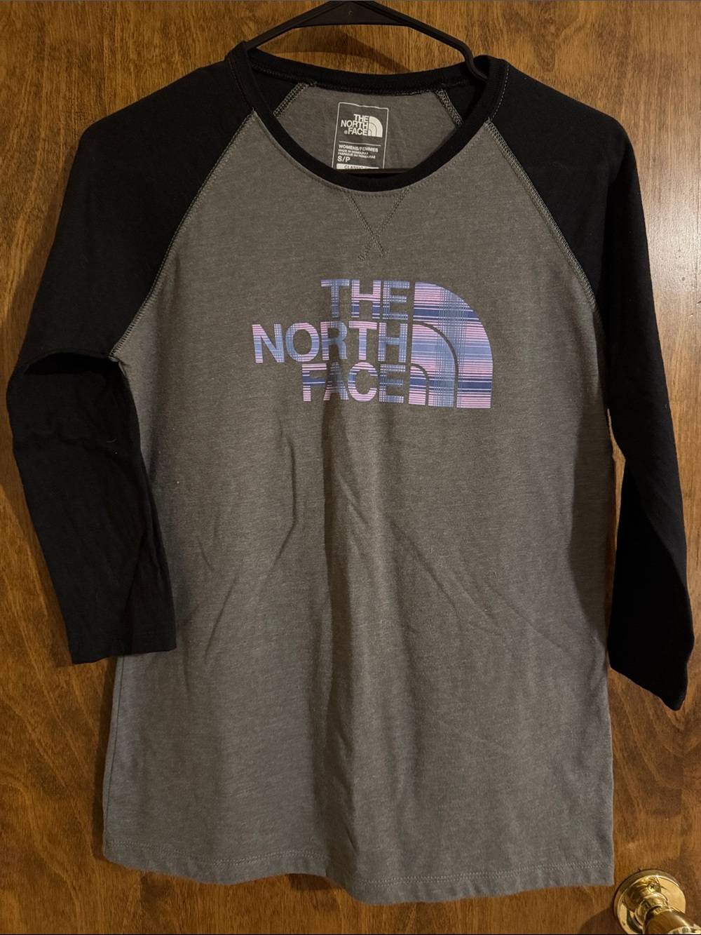The North Face Raglan Tee in Gray with Black Sleeves and Purple/Pink Logo